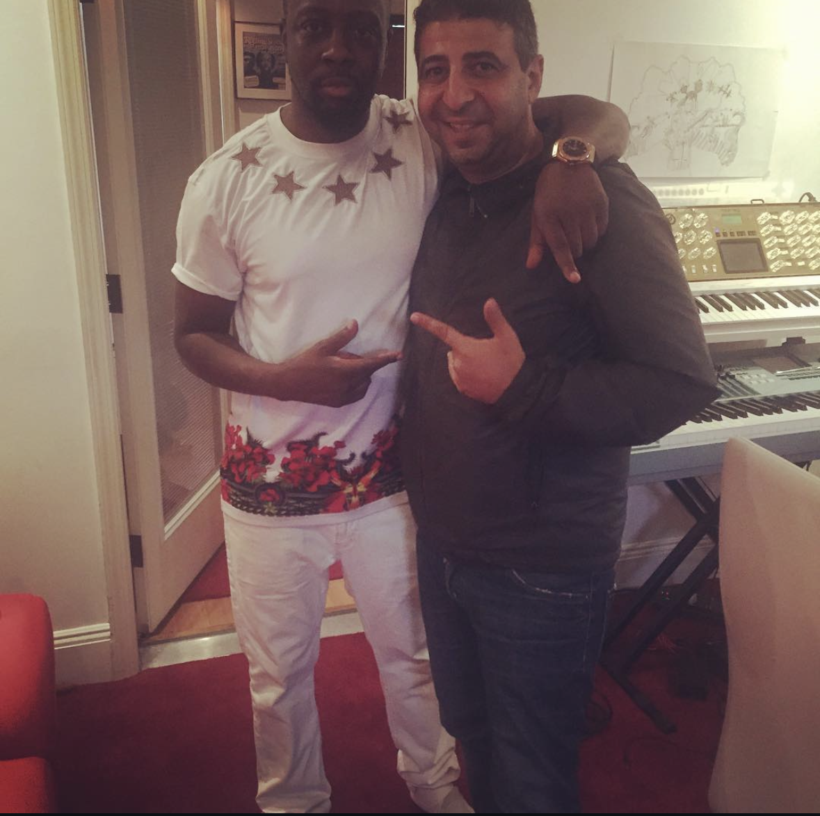 Richard Hussein with Wyclef Jean from The Fugees